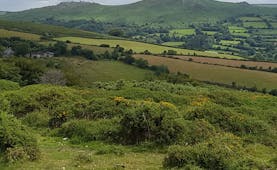 Dartmoor view of hills with rocky outcrops