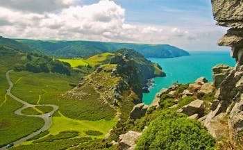 Valley of clifs and fields with sea below Lynton