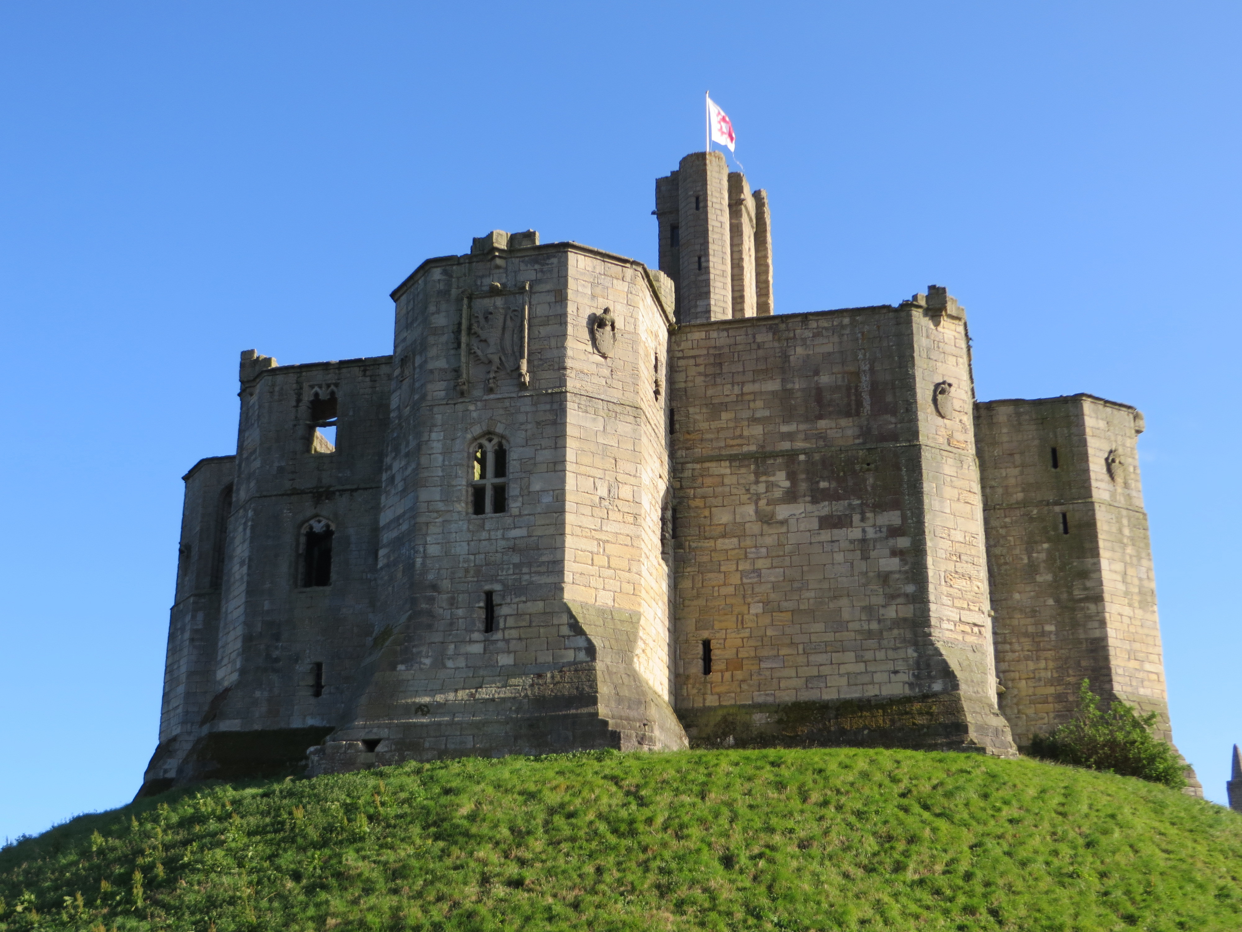 Keep of mediaeval castle on hilltop Northumberland