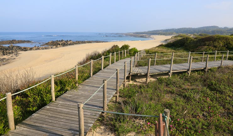Wooden walkway over sand dunes