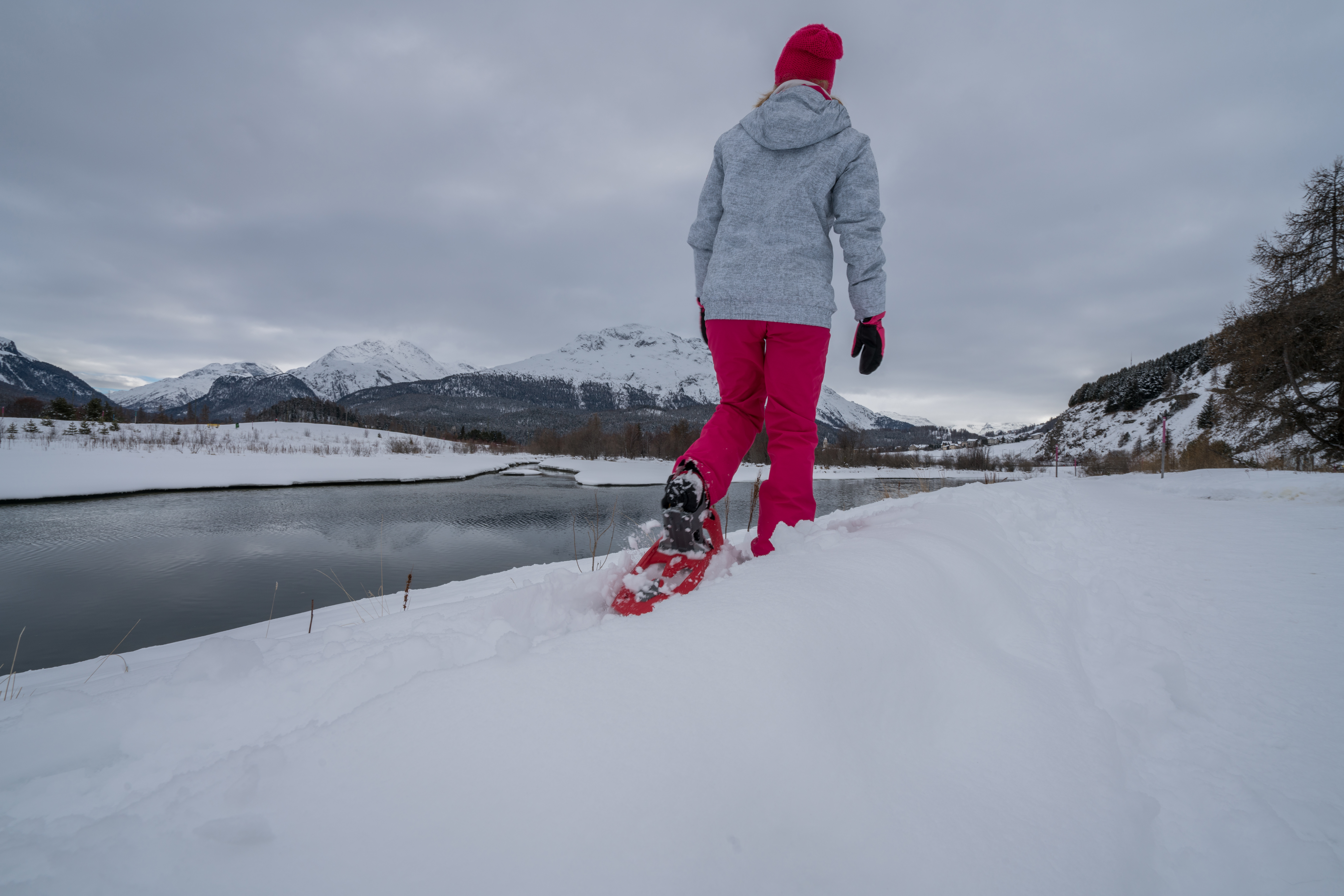 Lady dressed in red and white on red show shoes walking
